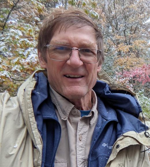 Photo of Ted Sweicki - a man with light brown hair and glasses